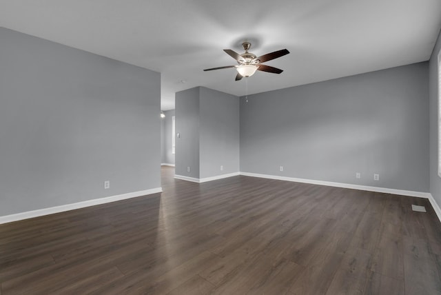 1493 Mcclardy Rd, Clarksville, TN 37042 - spare room featuring ceiling fan, dark wood-type flooring, and baseboards