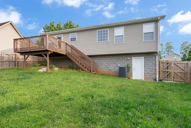 1493 Mcclardy Rd, Clarksville, TN 37042 - back of house with a wooden deck, stairs, and central AC