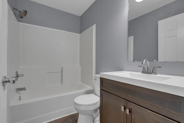 1493 Mcclardy Rd, Clarksville, TN 37042 - bathroom with toilet, wood finished floors, vanity, and washtub / shower combination