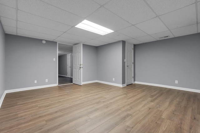1493 Mcclardy Rd, Clarksville, TN 37042 - spare room featuring wood finished floors, baseboards, and a paneled ceiling