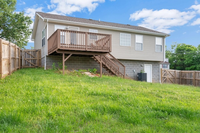 1493 Mcclardy Rd, Clarksville, TN 37042 - rear view of property featuring stairway, a wooden deck, a fenced backyard, and central AC unit