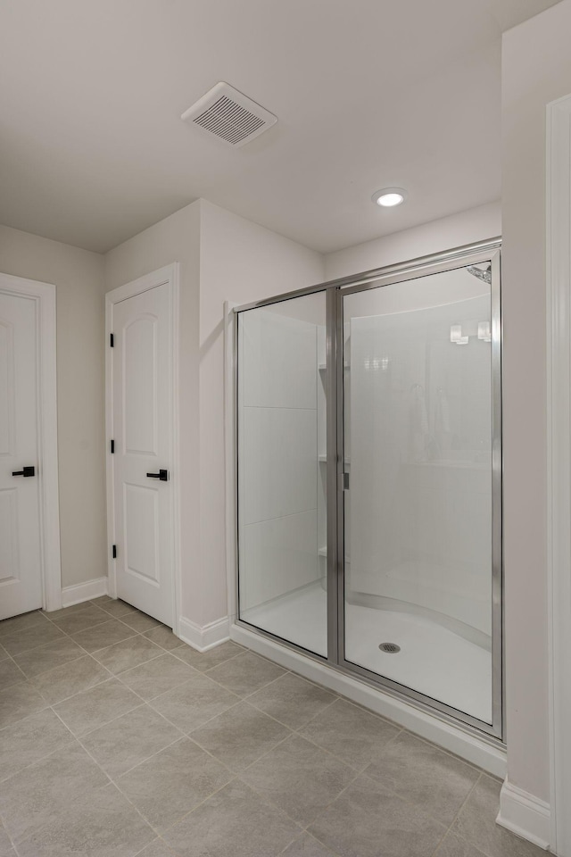 654 Taylor Bend Rd, Columbia, TN 38401 - full bathroom with tile patterned flooring, a shower stall, baseboards, and recessed lighting
