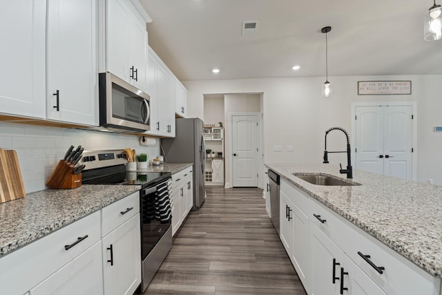 654 Taylor Bend Rd, Columbia, TN 38401 - kitchen featuring appliances with stainless steel finishes, a sink, recessed lighting, decorative backsplash, and white cabinets