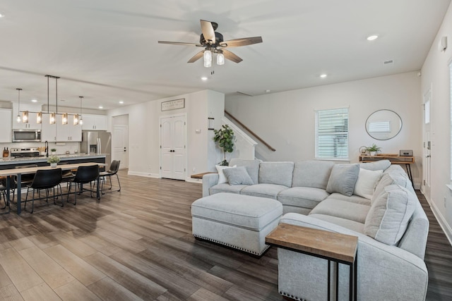 654 Taylor Bend Rd, Columbia, TN 38401 - living area featuring recessed lighting, dark wood-style floors, a ceiling fan, baseboards, and stairs