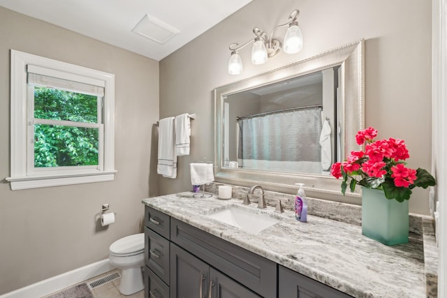 bathroom featuring toilet, baseboards, vanity, tile patterned flooring, and curtained shower