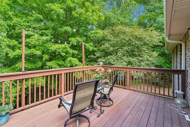 deck with outdoor dining space