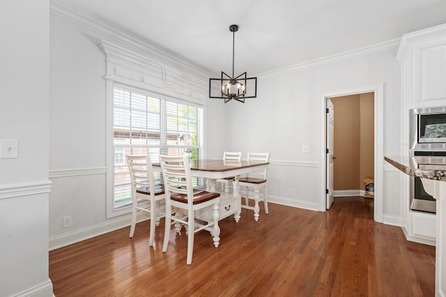 5417 Cavendish Dr, Murfreesboro, TN 37128 - dining room featuring a chandelier, wood finished floors, crown molding, and baseboards