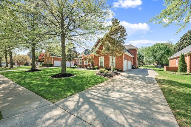 5417 Cavendish Dr, Murfreesboro, TN 37128 - view of front of home with concrete driveway, brick siding, an attached garage, and a front lawn