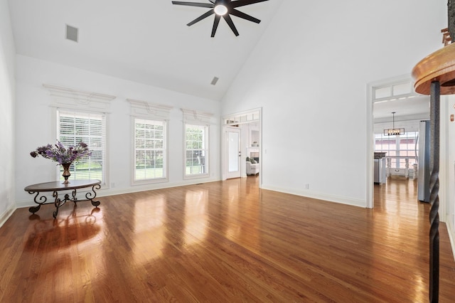 5417 Cavendish Dr, Murfreesboro, TN 37128 - living room featuring ceiling fan, high vaulted ceiling, wood finished floors, a chandelier, and baseboards