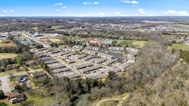 aerial view of property's location with nearby suburban area