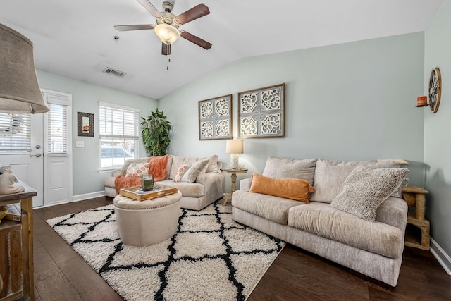 living area with lofted ceiling, a ceiling fan, baseboards, and wood finished floors