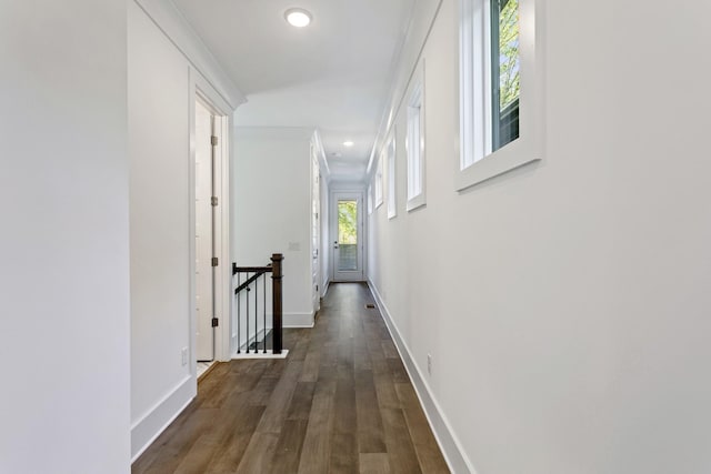 corridor featuring an upstairs landing, recessed lighting, dark wood-style floors, and baseboards