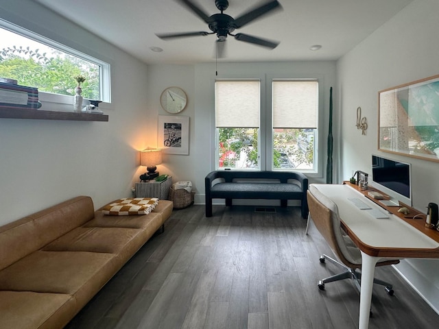 office area with a ceiling fan and wood finished floors