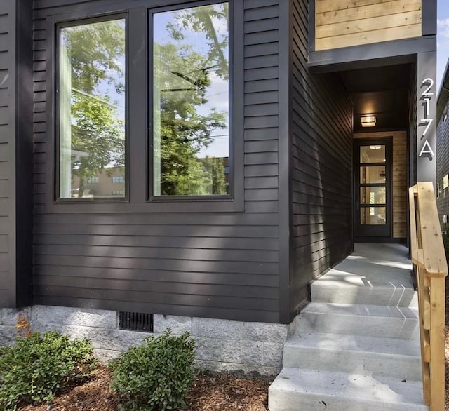 doorway to property featuring crawl space