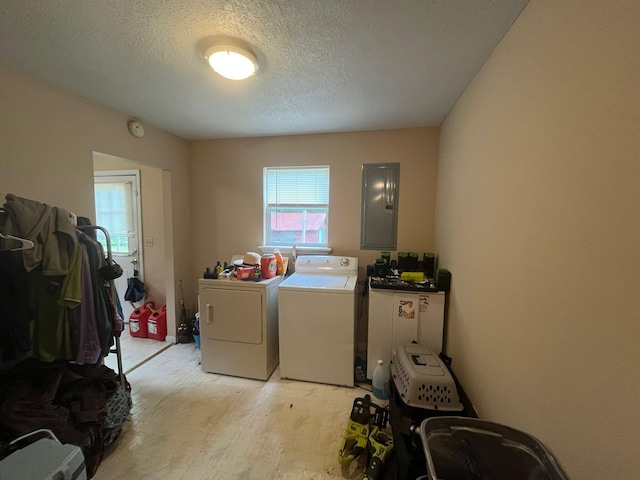 108 Butler Speedway, Bruceton, TN 38317 - laundry room featuring independent washer and dryer, electric panel, and a textured ceiling