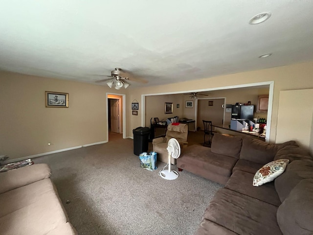 108 Butler Speedway, Bruceton, TN 38317 - living area featuring ceiling fan, carpet, and baseboards