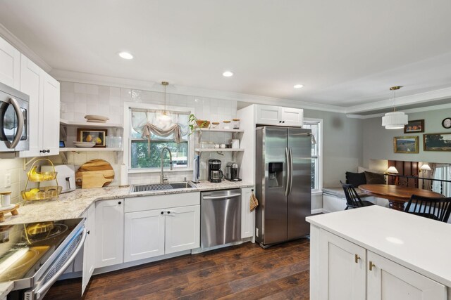 906 Temple Ct, Murfreesboro, TN 37130 - kitchen with appliances with stainless steel finishes, open shelves, a sink, ornamental molding, and tasteful backsplash