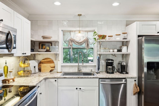 906 Temple Ct, Murfreesboro, TN 37130 - kitchen with stainless steel appliances, open shelves, a sink, decorative backsplash, and crown molding