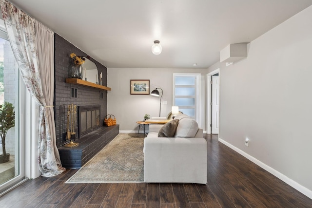 906 Temple Ct, Murfreesboro, TN 37130 - living area with a brick fireplace, baseboards, and wood finished floors