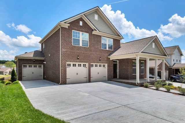 view of front of home with brick siding, concrete driveway, and a garage