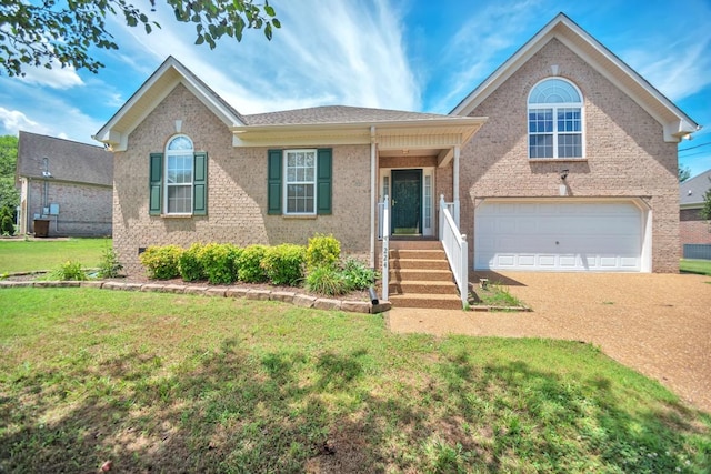 view of front of house featuring concrete driveway, a front lawn, an attached garage, and brick siding