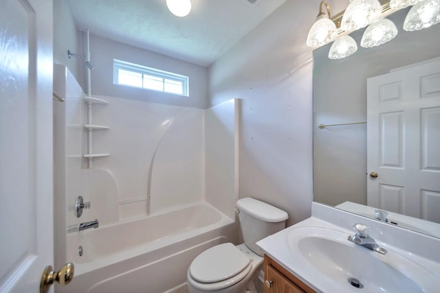 full bathroom with toilet, vanity,  shower combination, and a textured ceiling