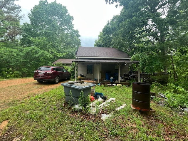 170 Keystone, Morris Chapel, TN 38361 - view of side of property featuring a shingled roof and a porch