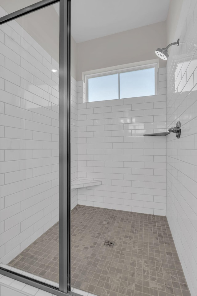513 Perrin Aly, Antioch, TN 37013 - bathroom featuring a shower stall and healthy amount of natural light