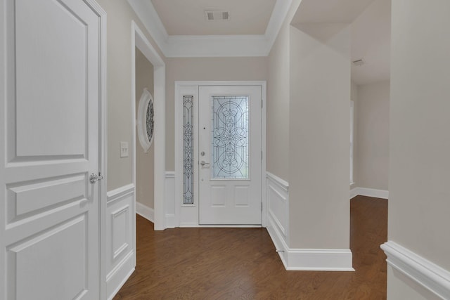 entryway featuring crown molding and dark wood-type flooring