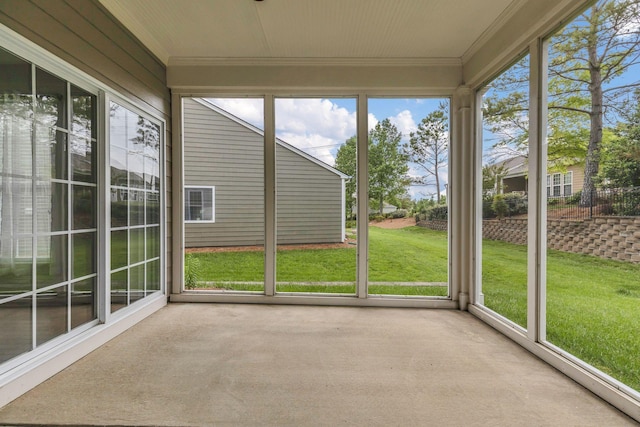 unfurnished sunroom featuring healthy amount of natural light