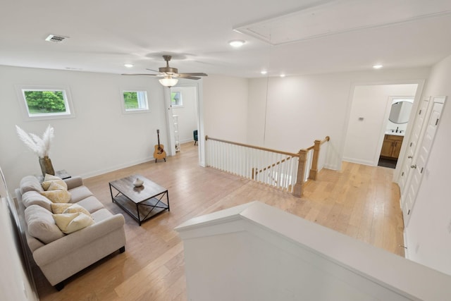 7214 Neills Branch Dr, College Grove, TN 37046 - living area featuring attic access, light wood-type flooring, recessed lighting, a ceiling fan, and baseboards