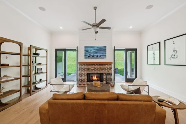 7214 Neills Branch Dr, College Grove, TN 37046 - living room with plenty of natural light, crown molding, light wood-style flooring, a brick fireplace, and ceiling fan