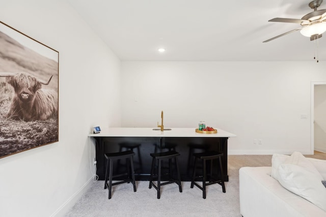 7214 Neills Branch Dr, College Grove, TN 37046 - dining area featuring light colored carpet, a ceiling fan, and baseboards
