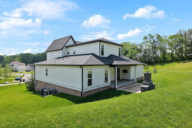 7214 Neills Branch Dr, College Grove, TN 37046 - rear view of house featuring a patio, a yard, central AC, and roof with shingles