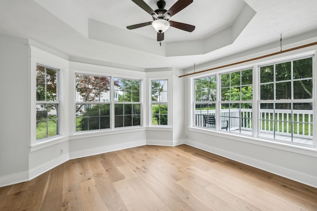 503 Mable Mason Cv, La Vergne, TN 37086 - unfurnished sunroom with a raised ceiling, plenty of natural light, and baseboards