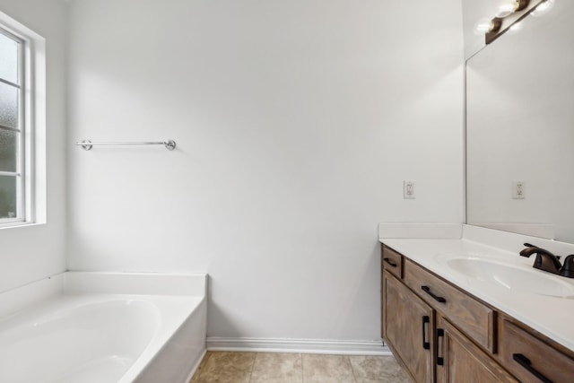 503 Mable Mason Cv, La Vergne, TN 37086 - full bathroom featuring plenty of natural light, a bath, vanity, and tile patterned floors