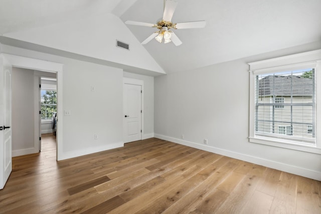503 Mable Mason Cv, La Vergne, TN 37086 - unfurnished room with light wood-type flooring, baseboards, a ceiling fan, and high vaulted ceiling