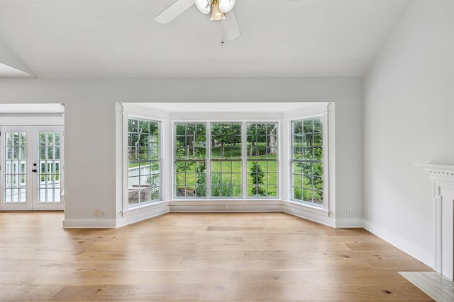 503 Mable Mason Cv, La Vergne, TN 37086 - unfurnished living room with baseboards, light wood finished floors, french doors, and a ceiling fan