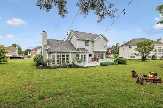 503 Mable Mason Cv, La Vergne, TN 37086 - rear view of house featuring an outdoor fire pit, a patio, a yard, and a chimney