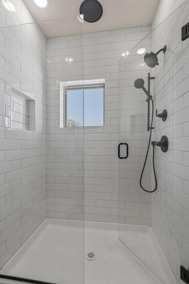 bathroom with a stall shower