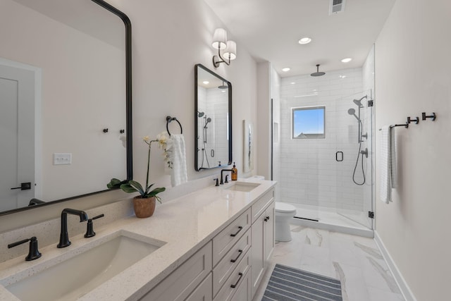 bathroom with marble finish floors, a stall shower, recessed lighting, double vanity, and baseboards
