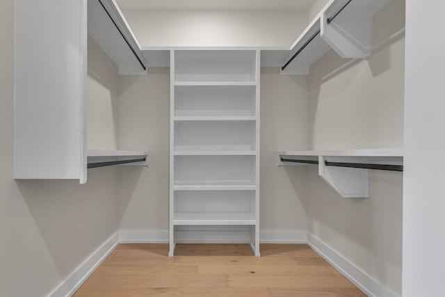 spacious closet with light wood-type flooring
