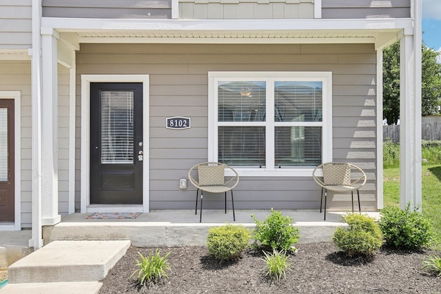 property entrance with a porch