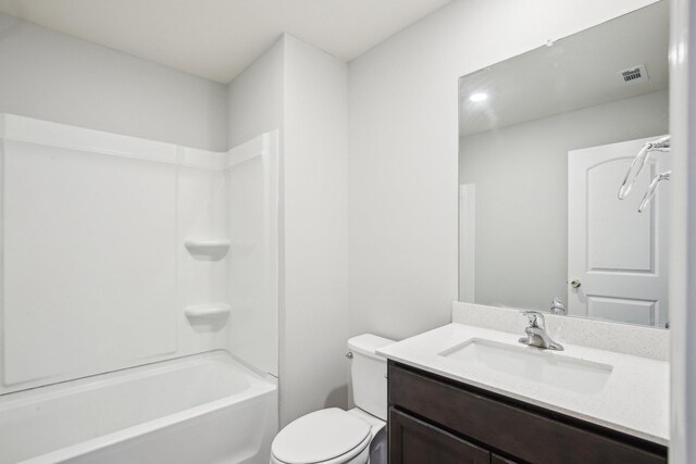 full bath featuring toilet, vanity, recessed lighting, and bathing tub / shower combination