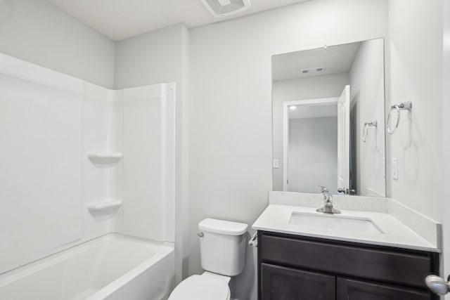 full bathroom with toilet, vanity, and bathing tub / shower combination