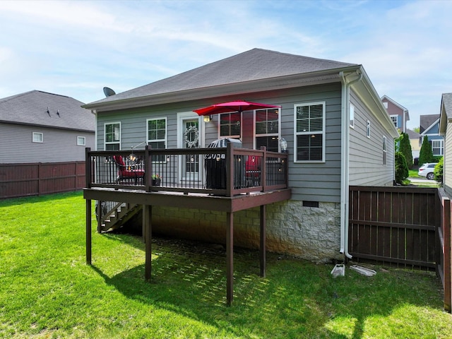 back of property featuring a deck and crawl space