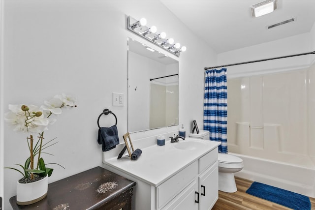 237 Windsor Ct, Spring City, TN 37381 - bathroom featuring toilet, shower / tub combo, vanity, and wood finished floors