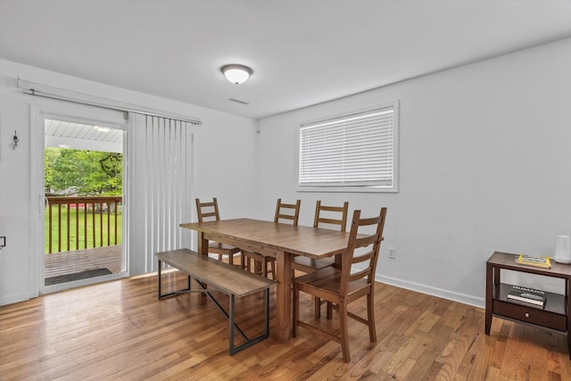 237 Windsor Ct, Spring City, TN 37381 - dining room with light wood finished floors and baseboards