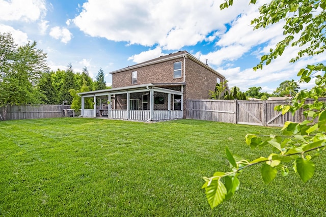 2303 Dewey Dr, Spring Hill, TN 37174 - back of property with brick siding and a gate