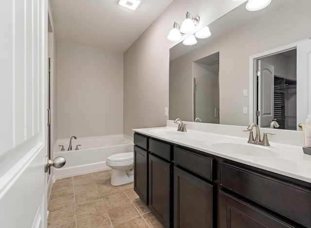 2303 Dewey Dr, Spring Hill, TN 37174 - full bathroom with a bath, double vanity, a shower stall, and toilet